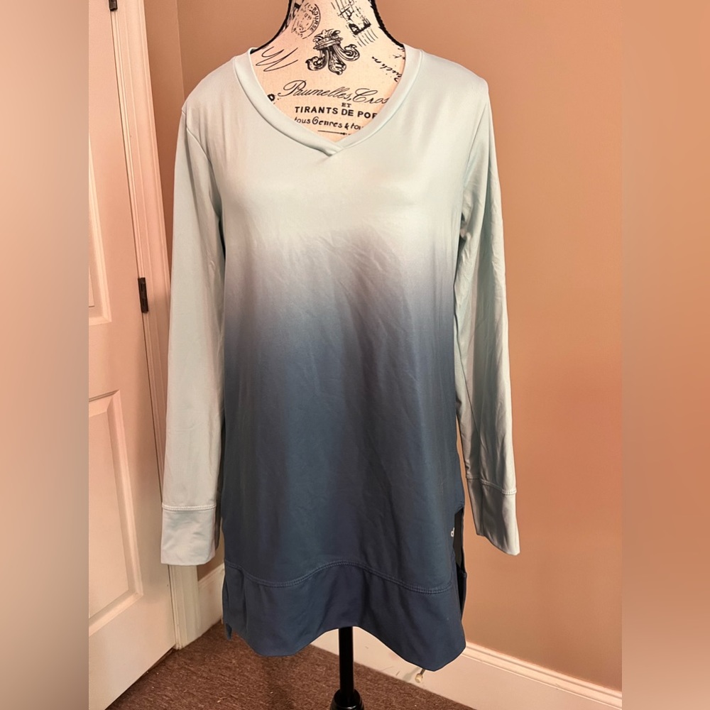 White faded into dark gray. This is a workout top.